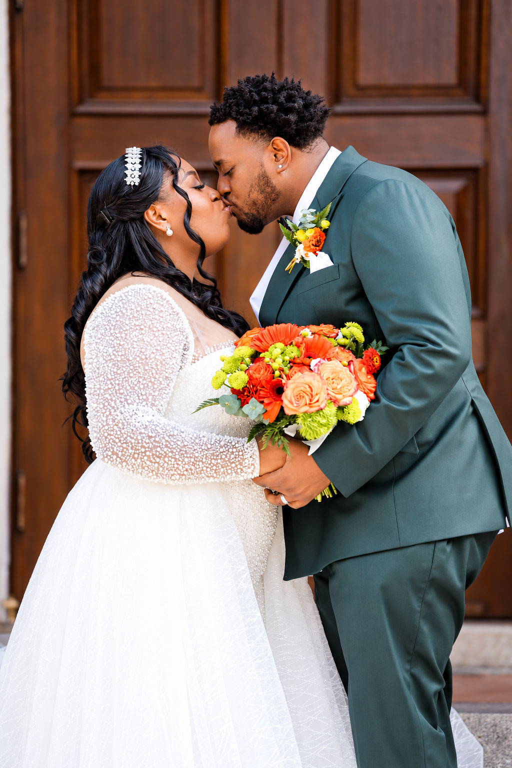Aaliyah and Alex sharing a close kiss