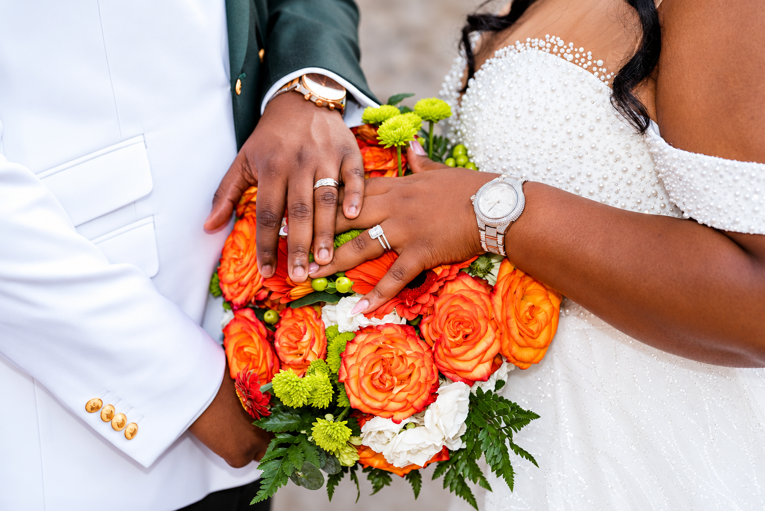 Aaliyah and Alex's rings and bouquet