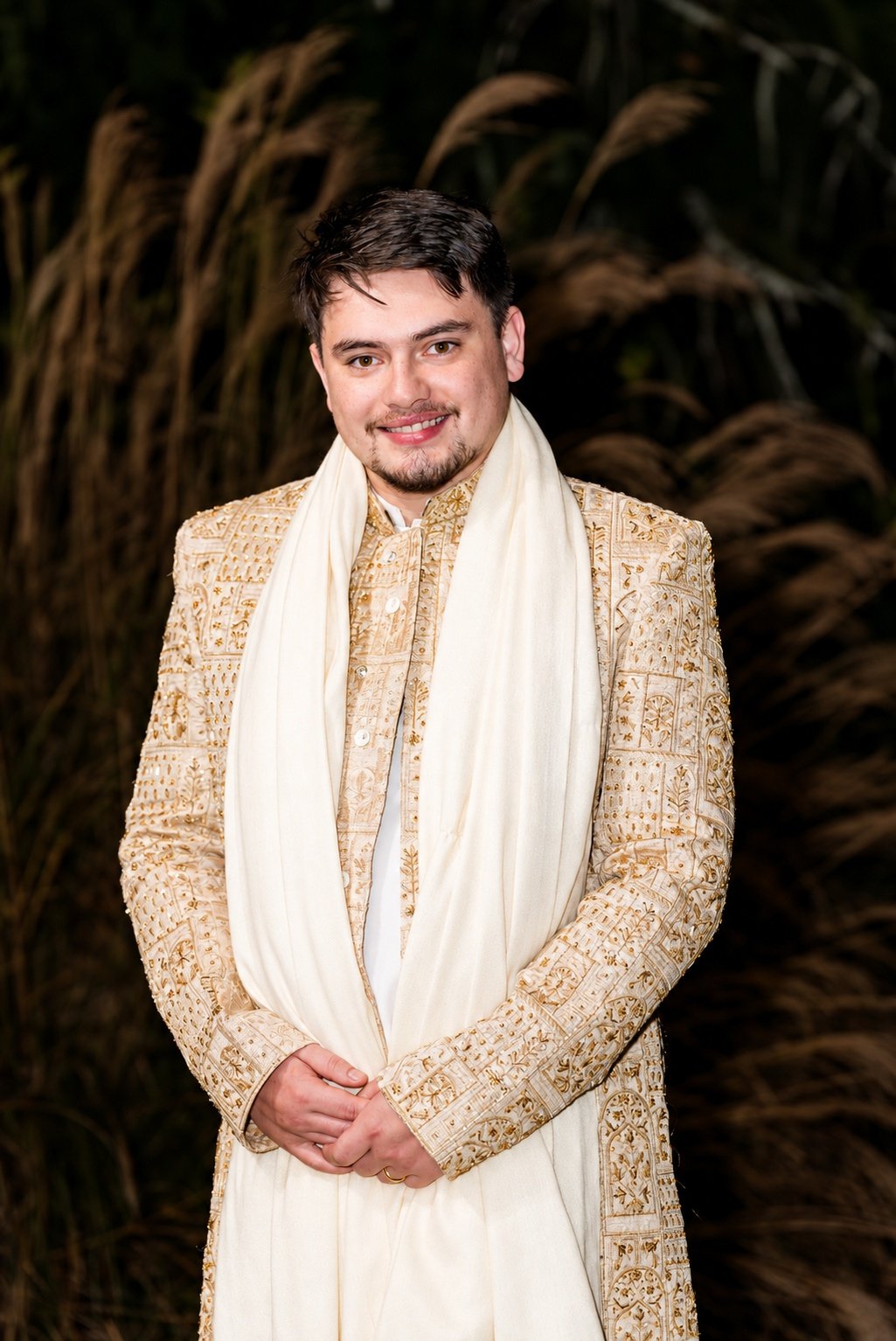 Reeham and Logan—groom in reception attire