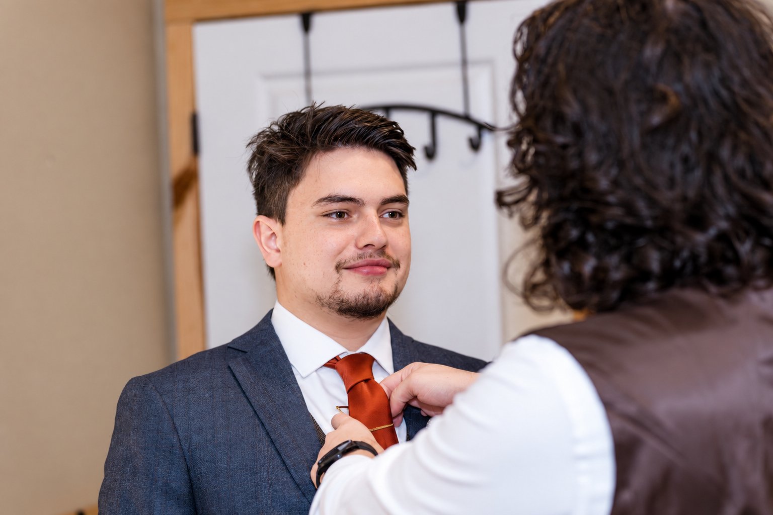 Reeham and Logan—groom getting ready