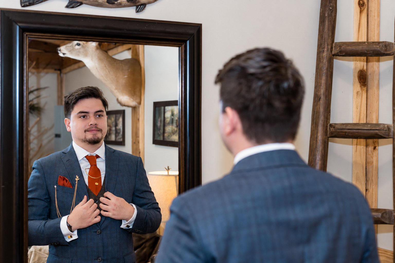 Reeham and Logan—groom in the mirror