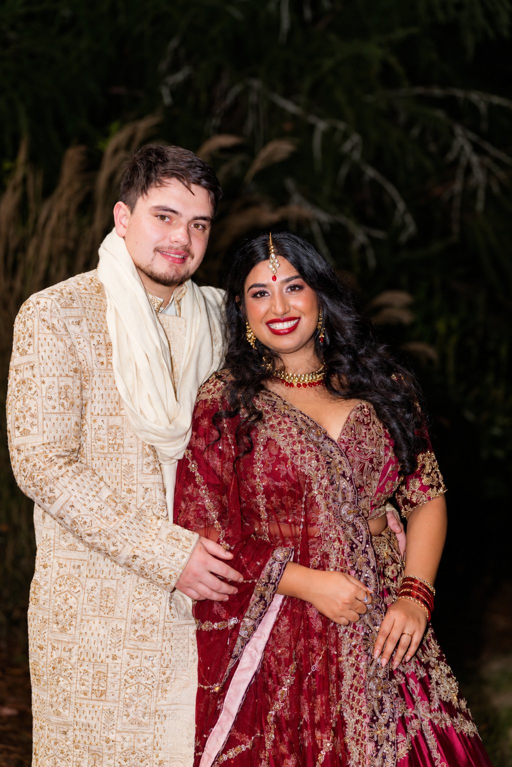 Reeham and Logan—couple in reception attire