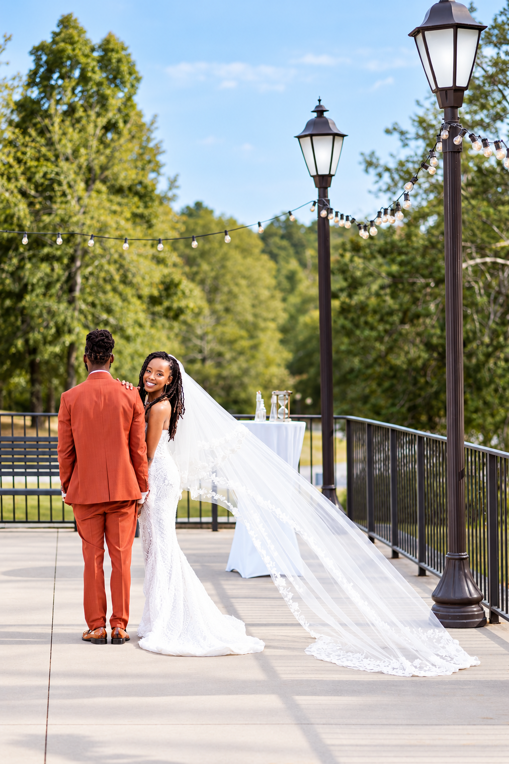 Bridal veil couple portrait at Burnett and Jaelyn's wedding