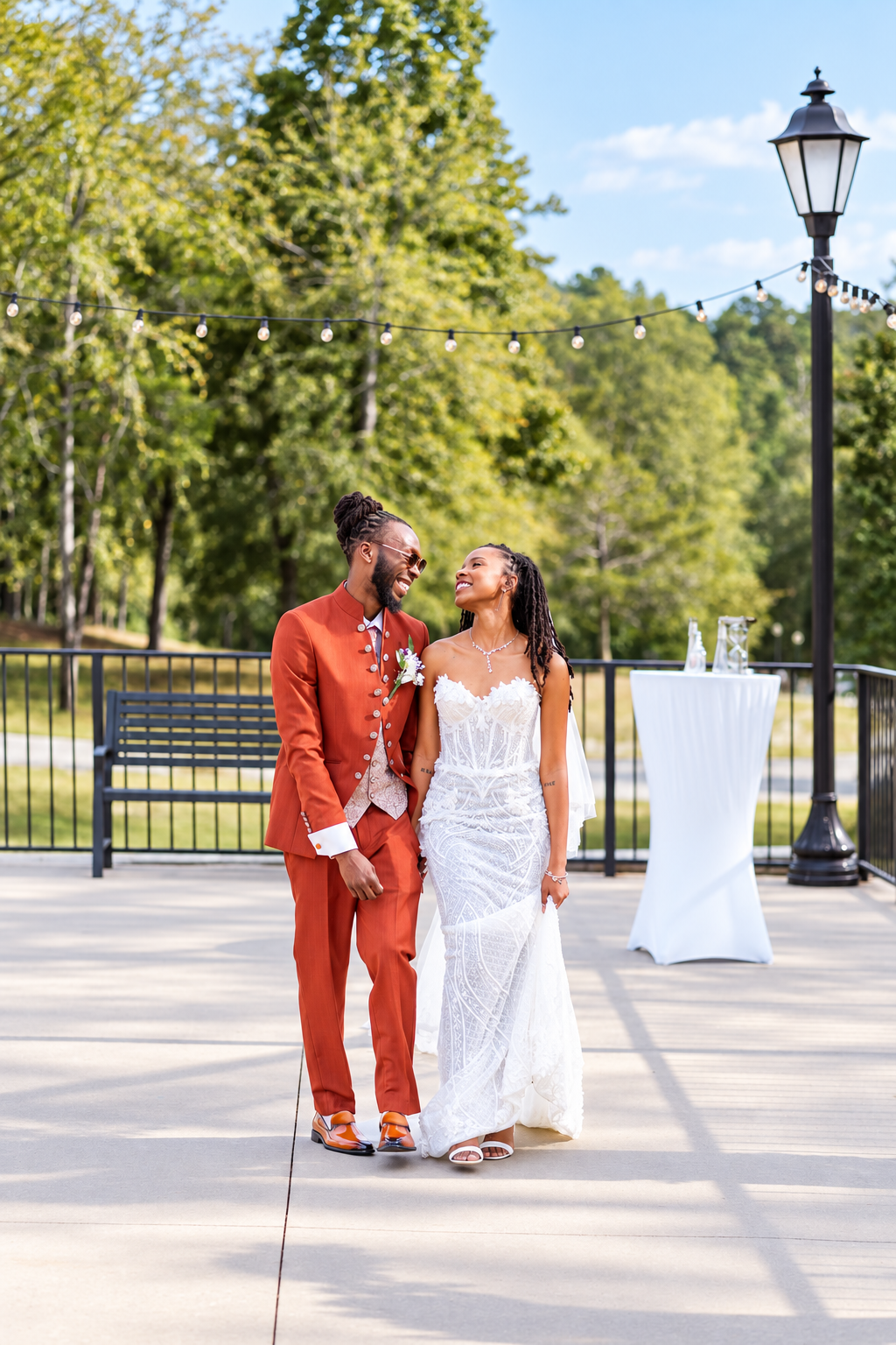 Bride groom walking portrait at Burnett and Jaelyn's wedding