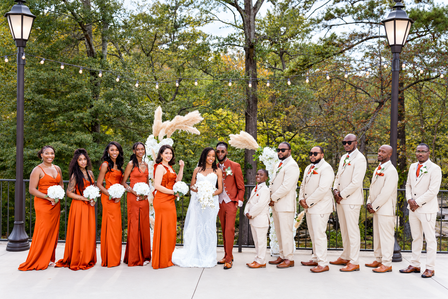 Orange ivory wedding party at Burnett and Jaelyn's wedding