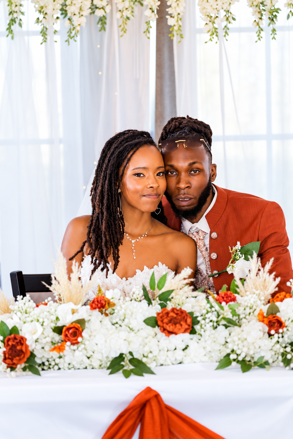 Sweetheart table couple portrait at Burnett and Jaelyn's wedding