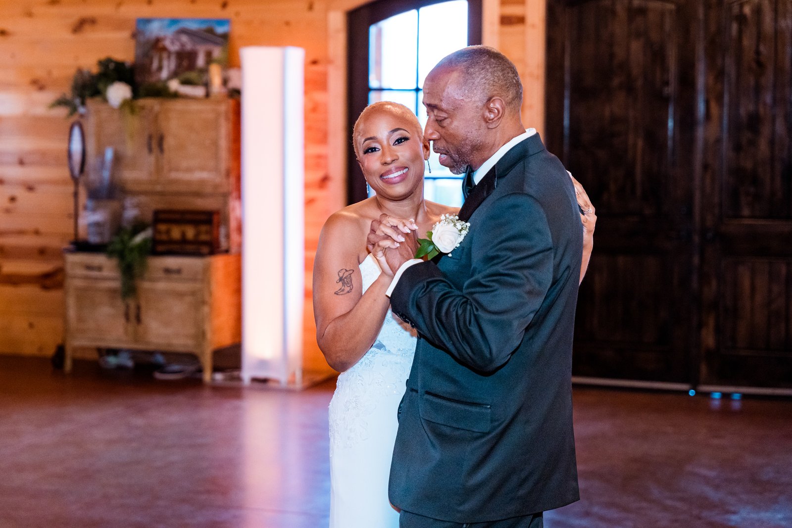 Jillian shares a reception dance with a family member