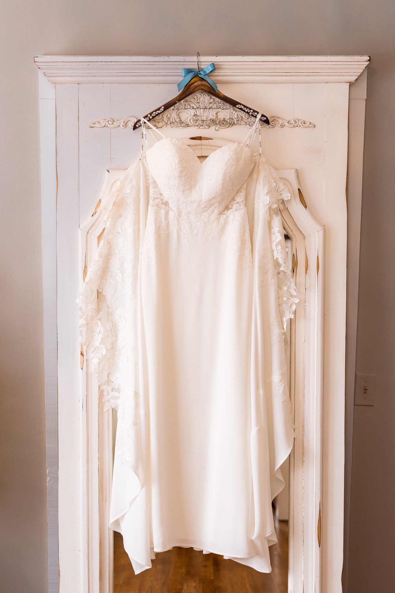 Jillian's wedding dress hanging before the ceremony