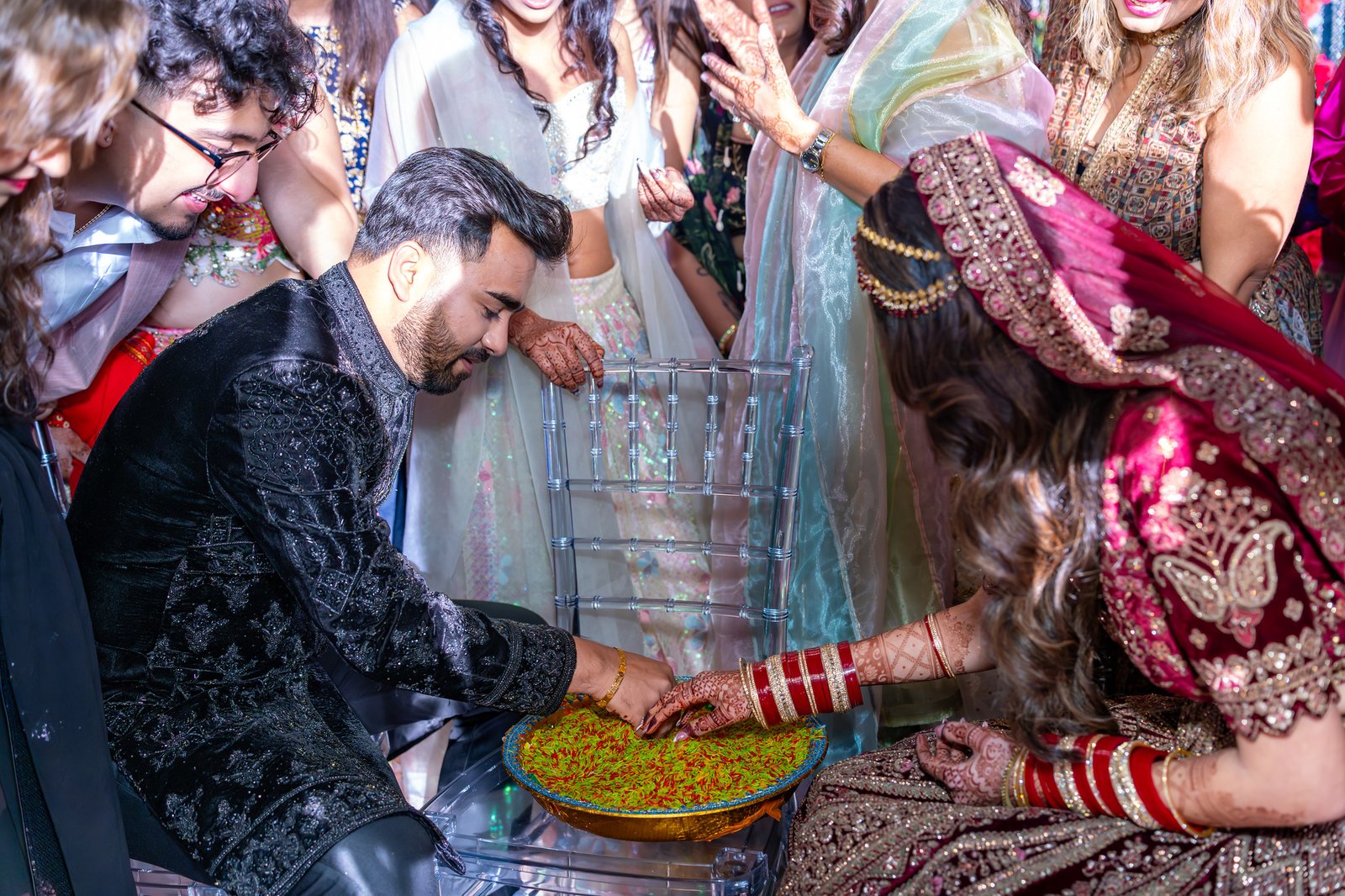 Mehreen and Shahzain share a reception game surrounded by guests