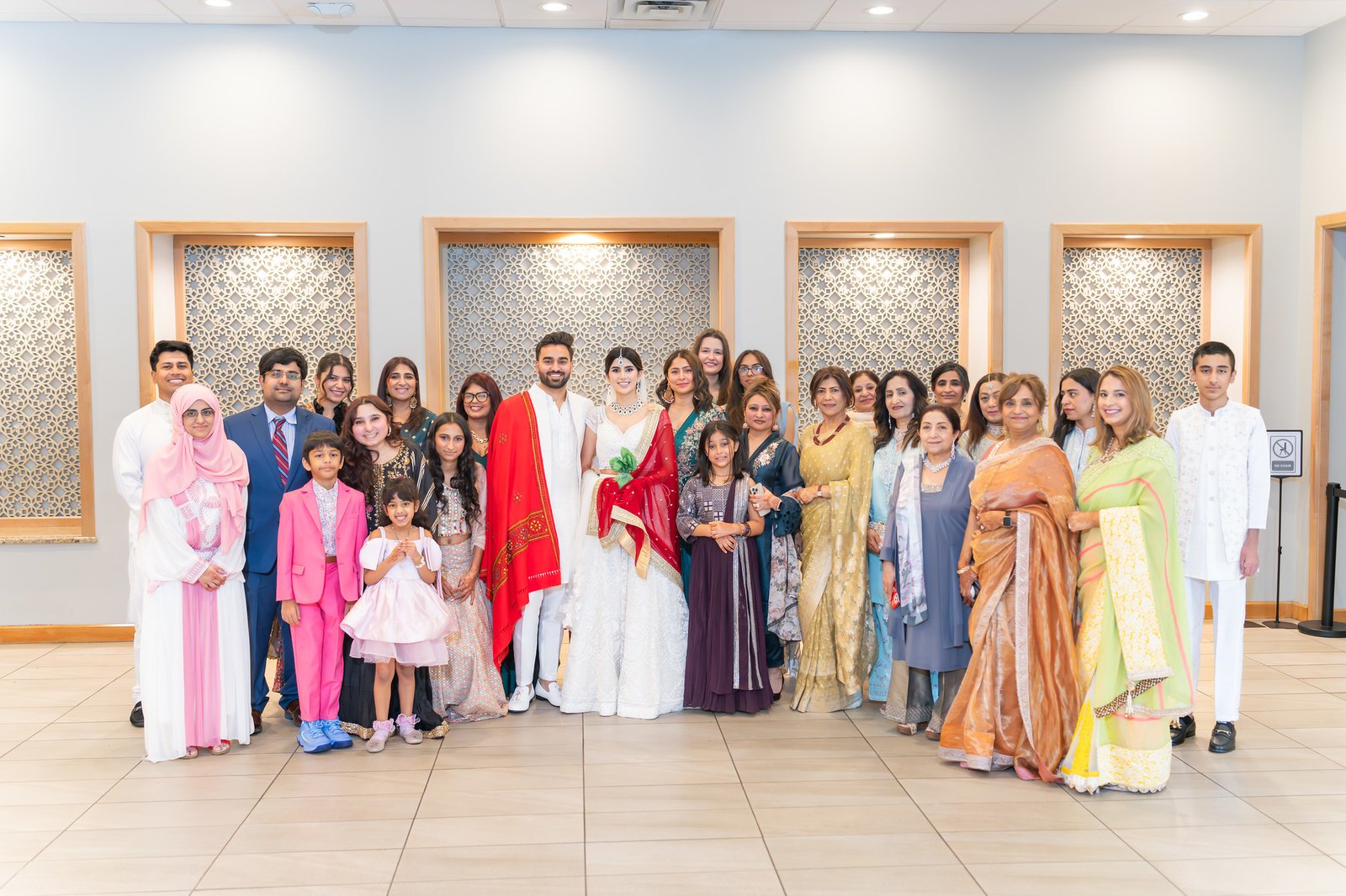 Mehreen and Shahzain gather with family for a group portrait