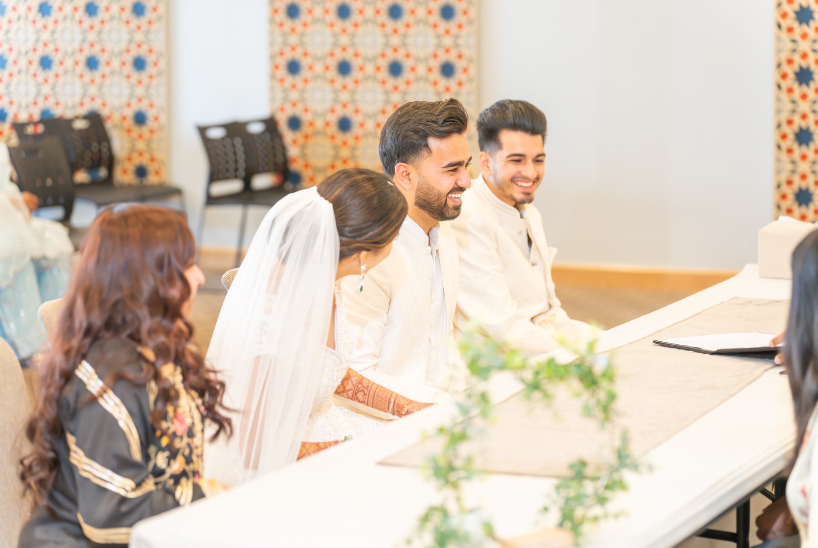 Shahzain laughs beside Mehreen during the ceremony