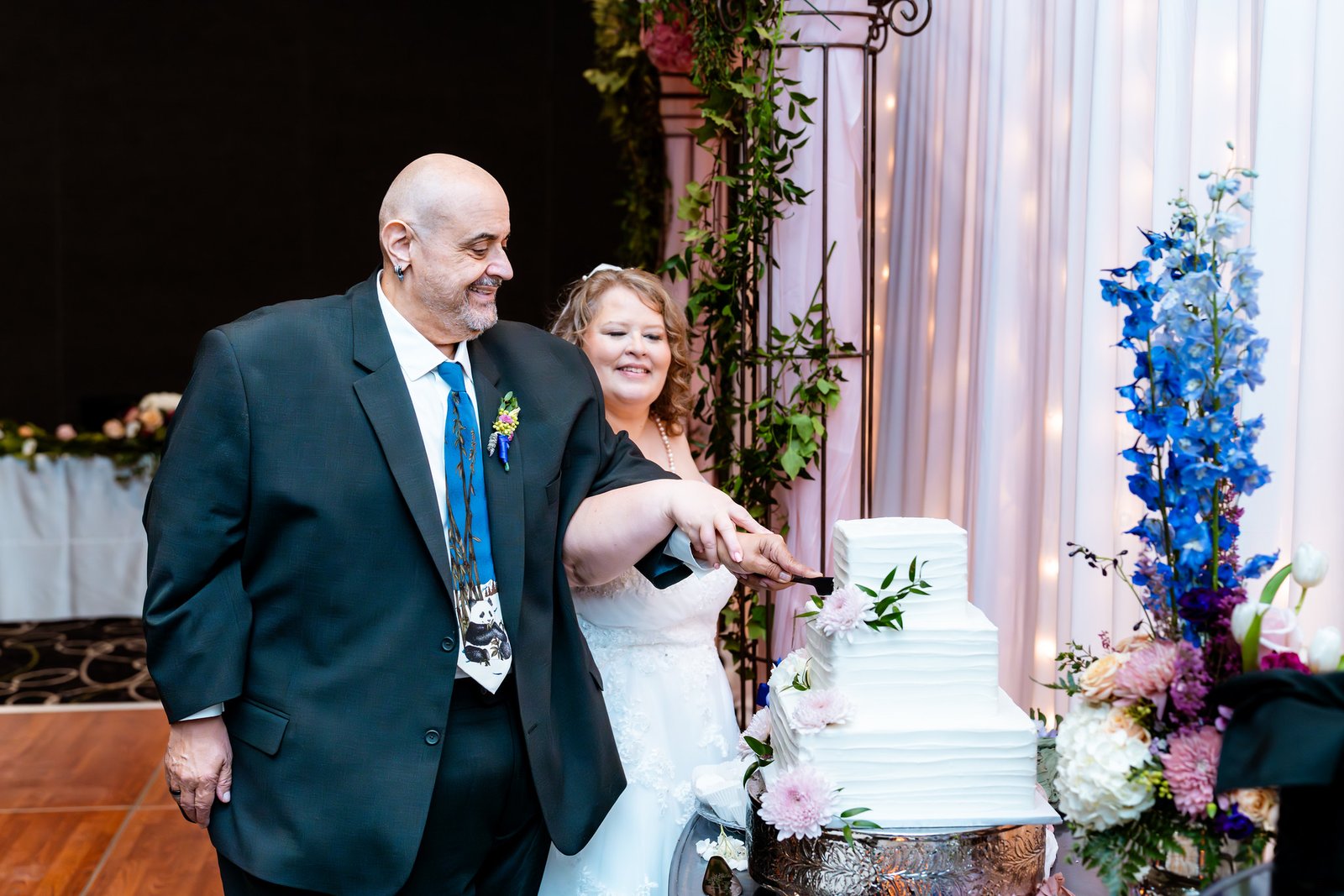 The couple cut their wedding cake together
