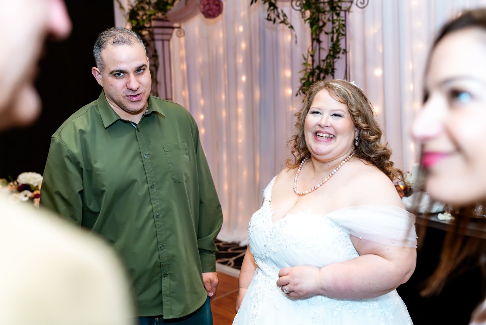 Towanna laughs among friends at the reception