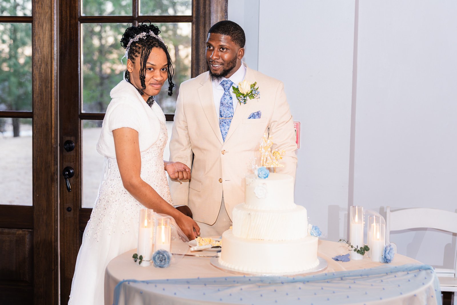 Tanjana and Marcel cut their wedding cake