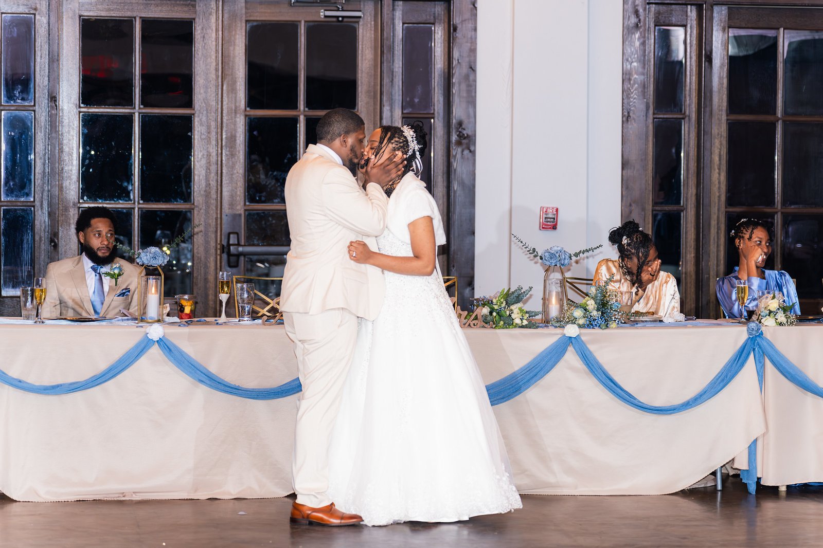 Tanjana and Marcel kiss during an evening dance