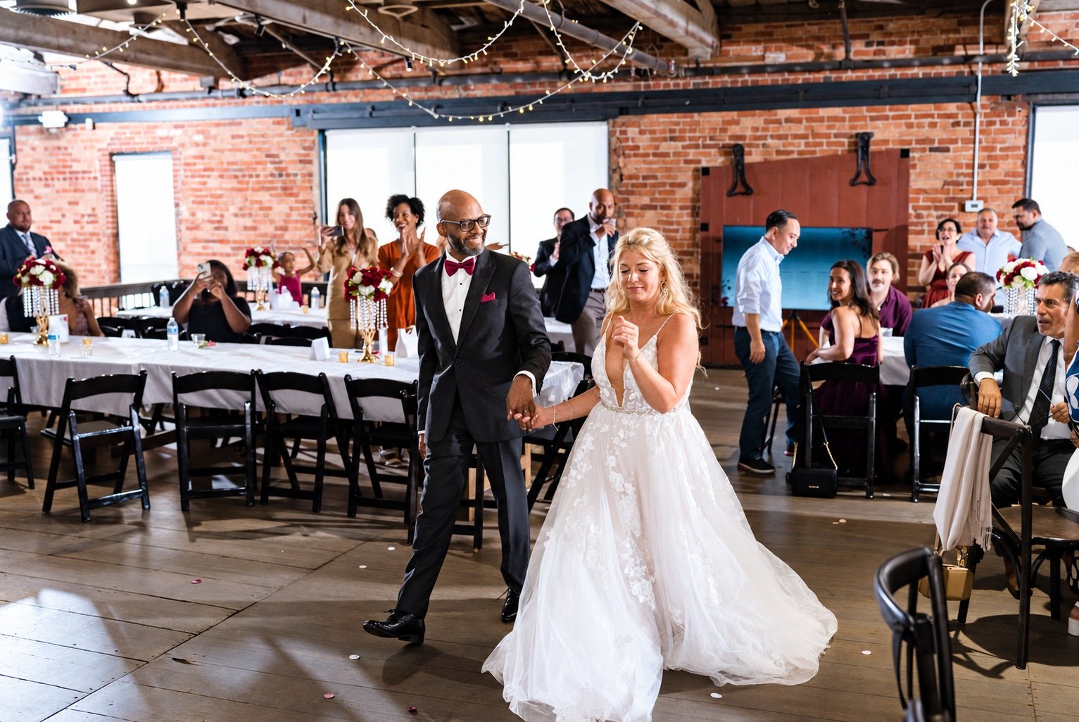 Franz and Mikayla entering their wedding reception