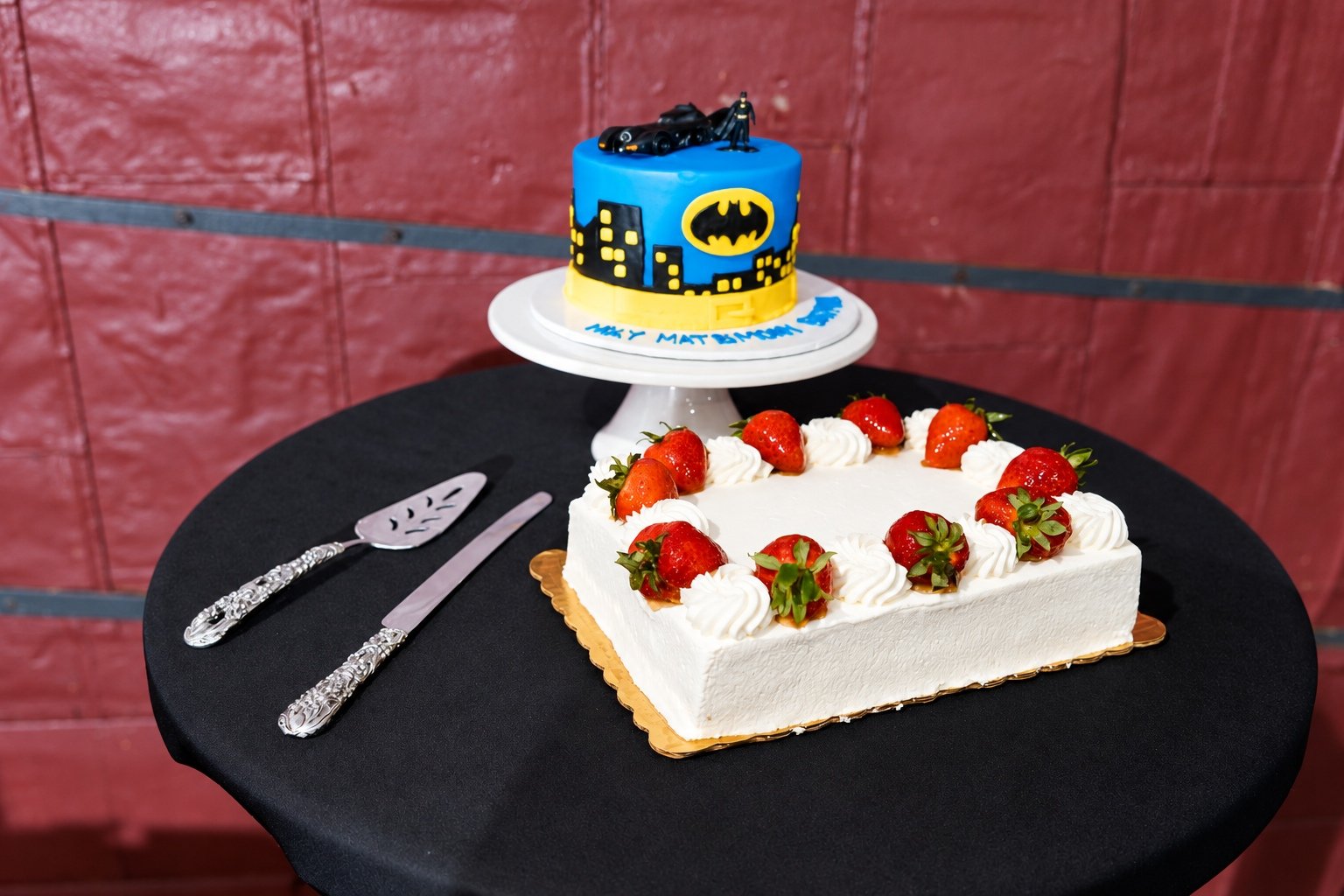 Their wedding cake with a Batman themed tier