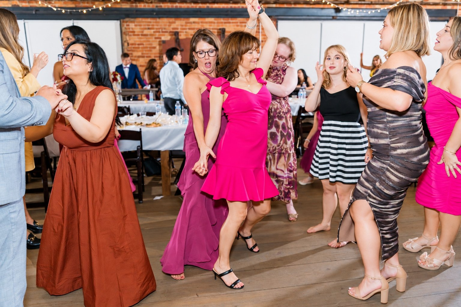 Guests dancing at the Boxwood Social Hall reception