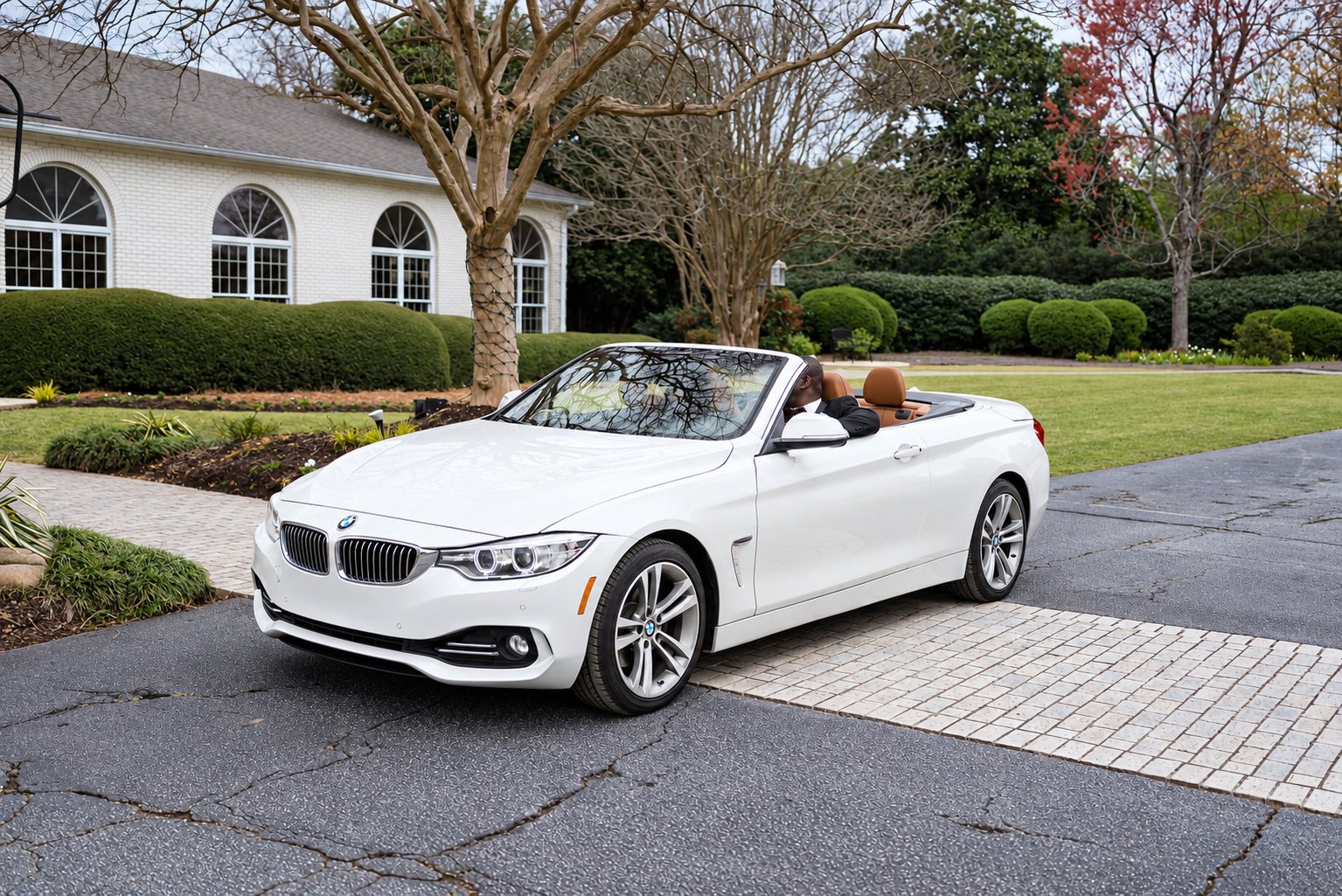 White convertible outside the session setting