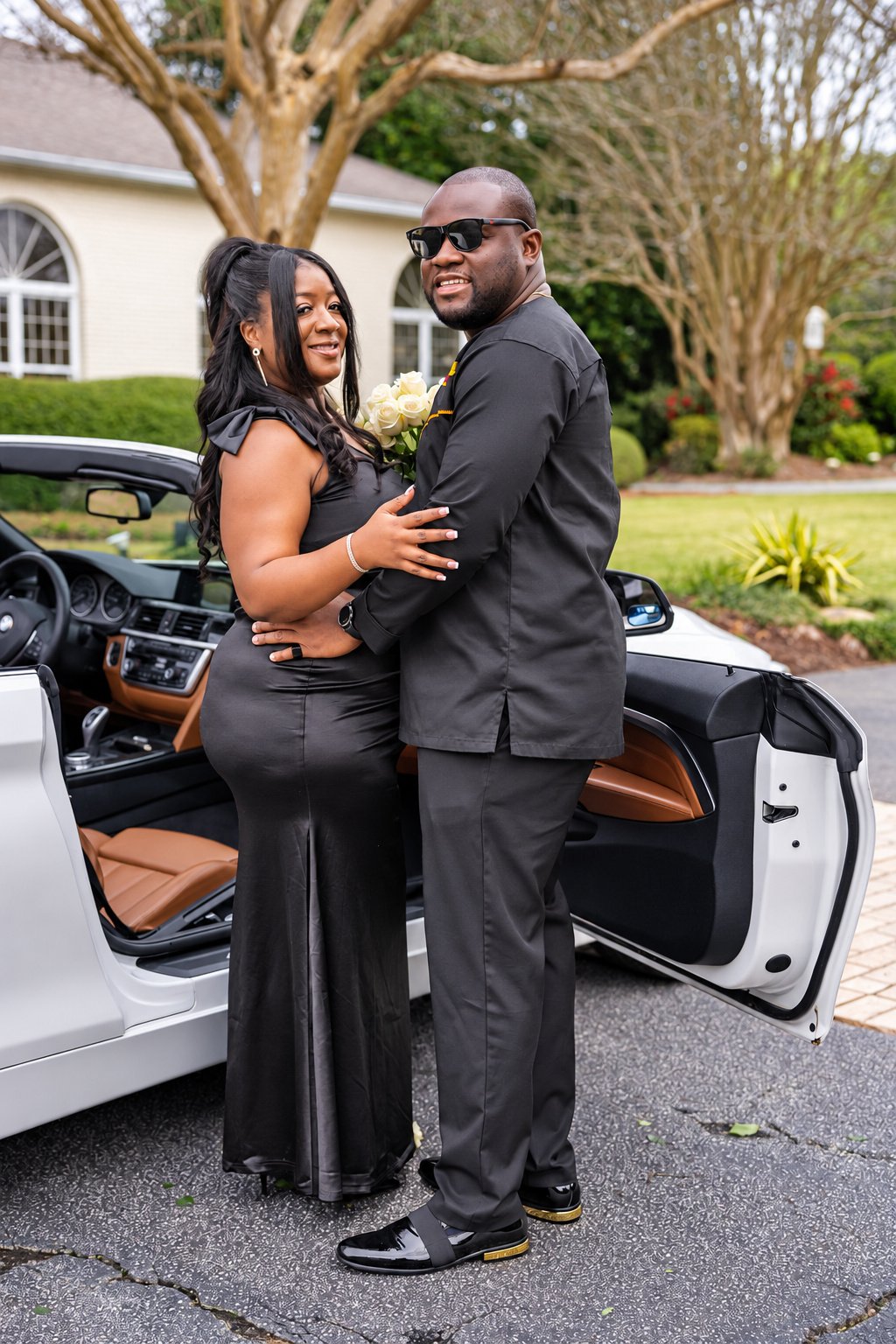 Couple portrait beside the convertible