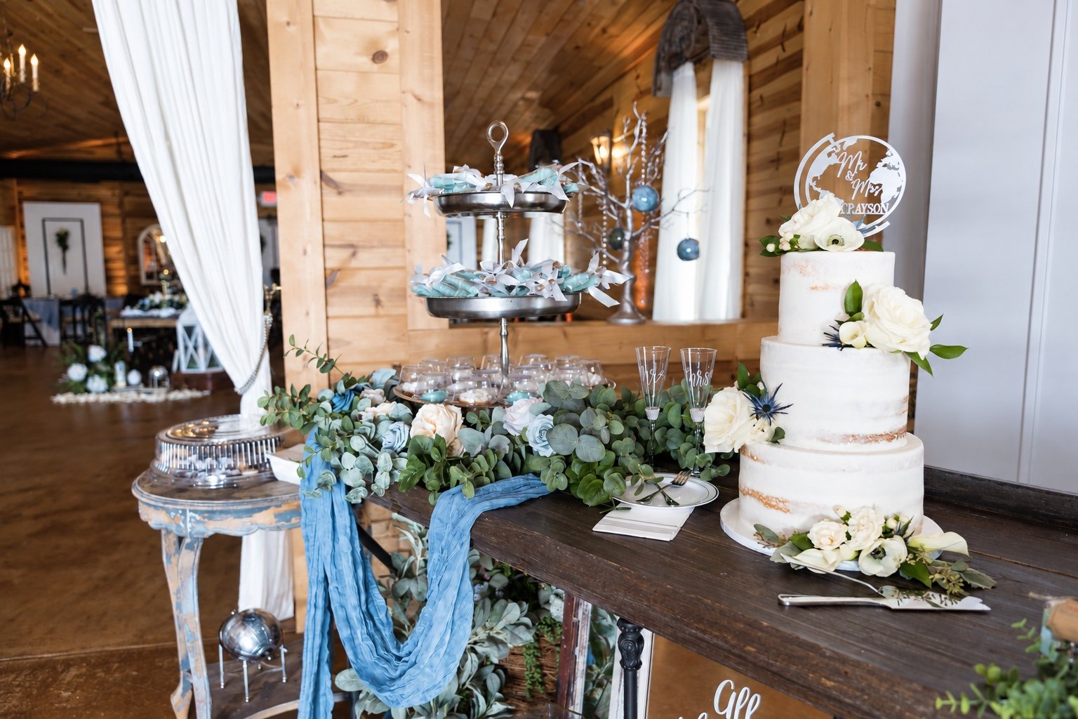 Wedding cake, flowers and reception details at Fendley Farmstead