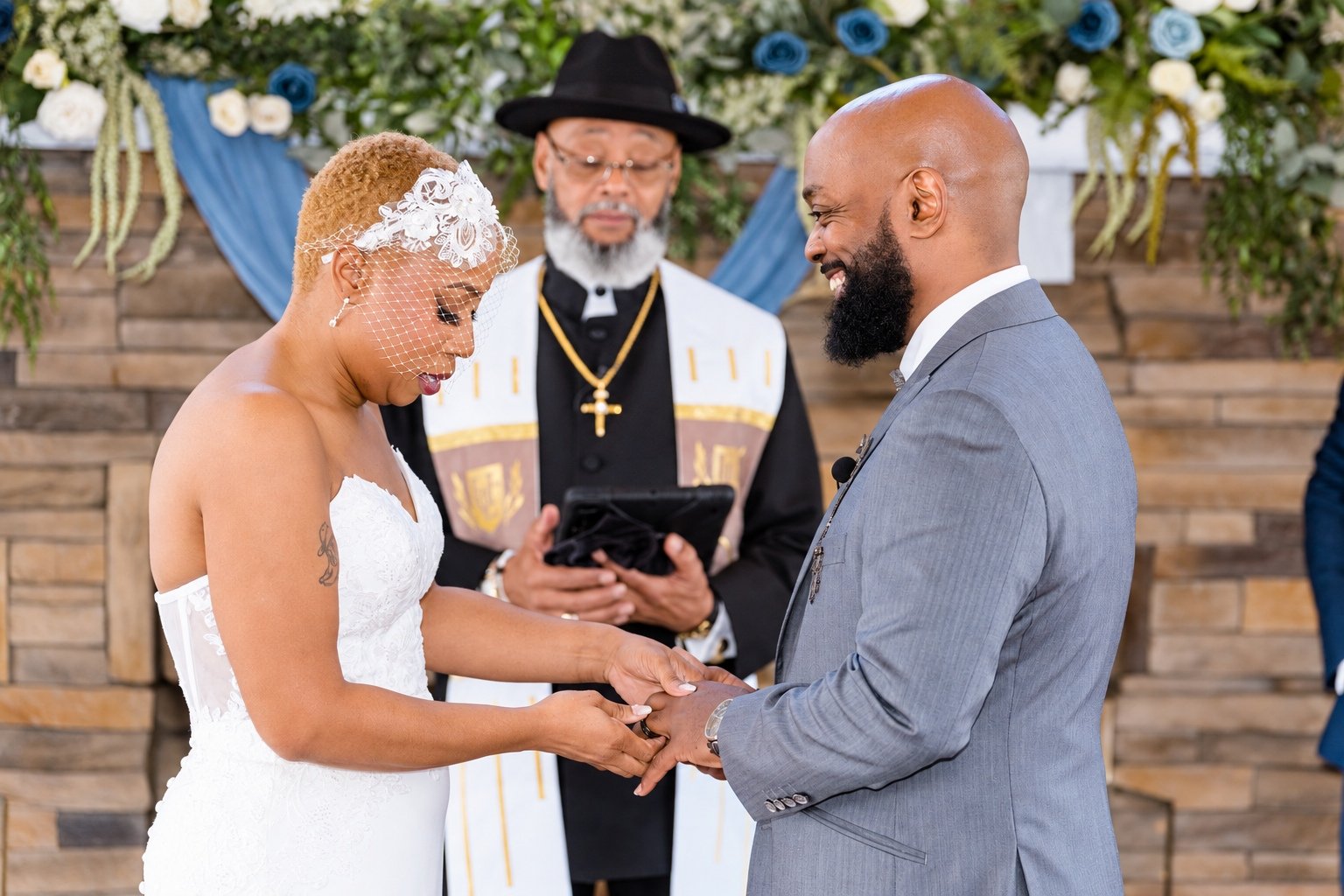 Maurice and Jillian exchanging rings during their wedding ceremony