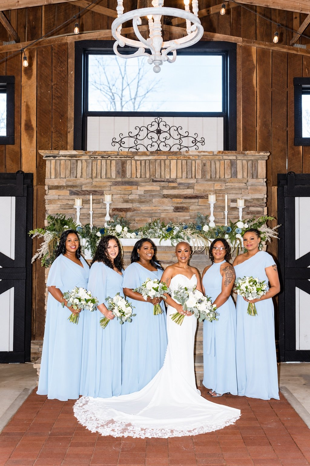 Jillian and her attendants posing inside Fendley Farmstead
