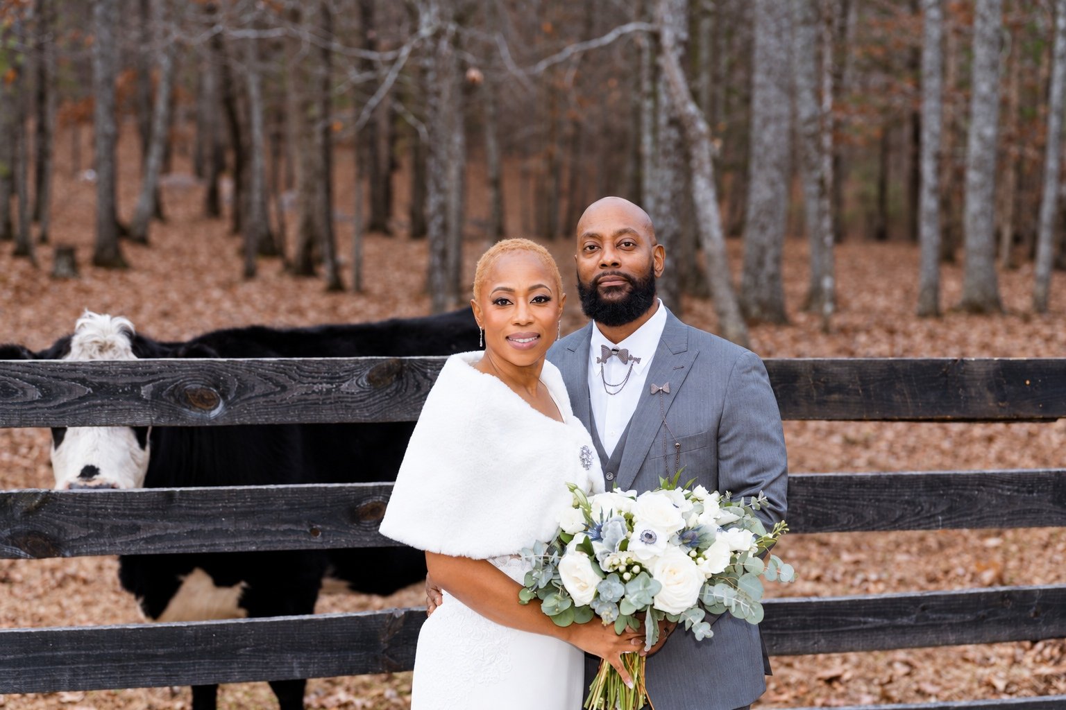 Maurice and Jillian standing together on the bridge at Fendley Farmstead