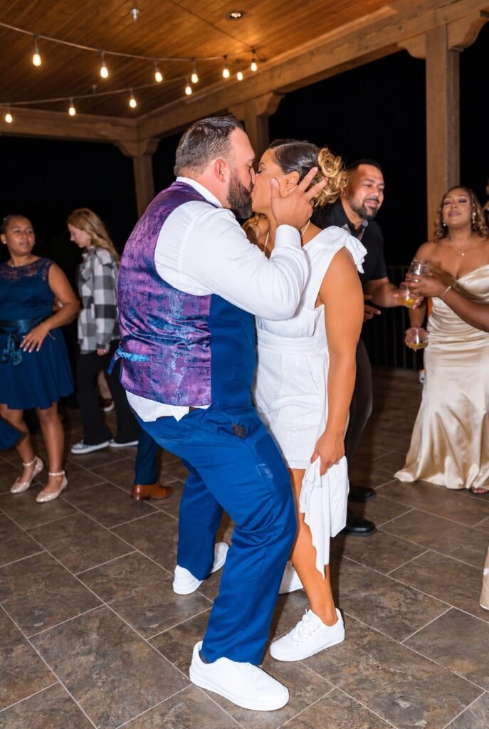 Couple dancing with guests nearby at Montaluce Winery in Dahlonega, Georgia.