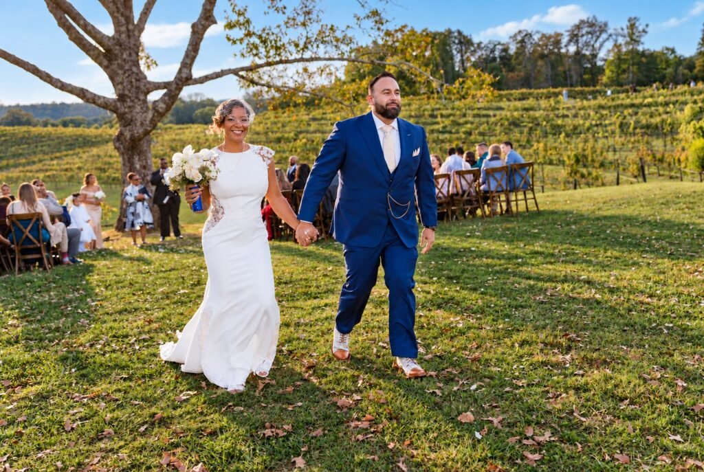 Couple walking after the ceremony at Montaluce Winery in Dahlonega, Georgia.