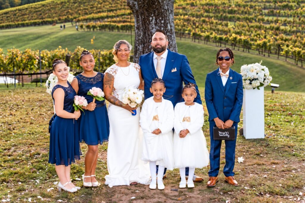 Group wedding portrait outdoors at Montaluce Winery in Dahlonega, Georgia.